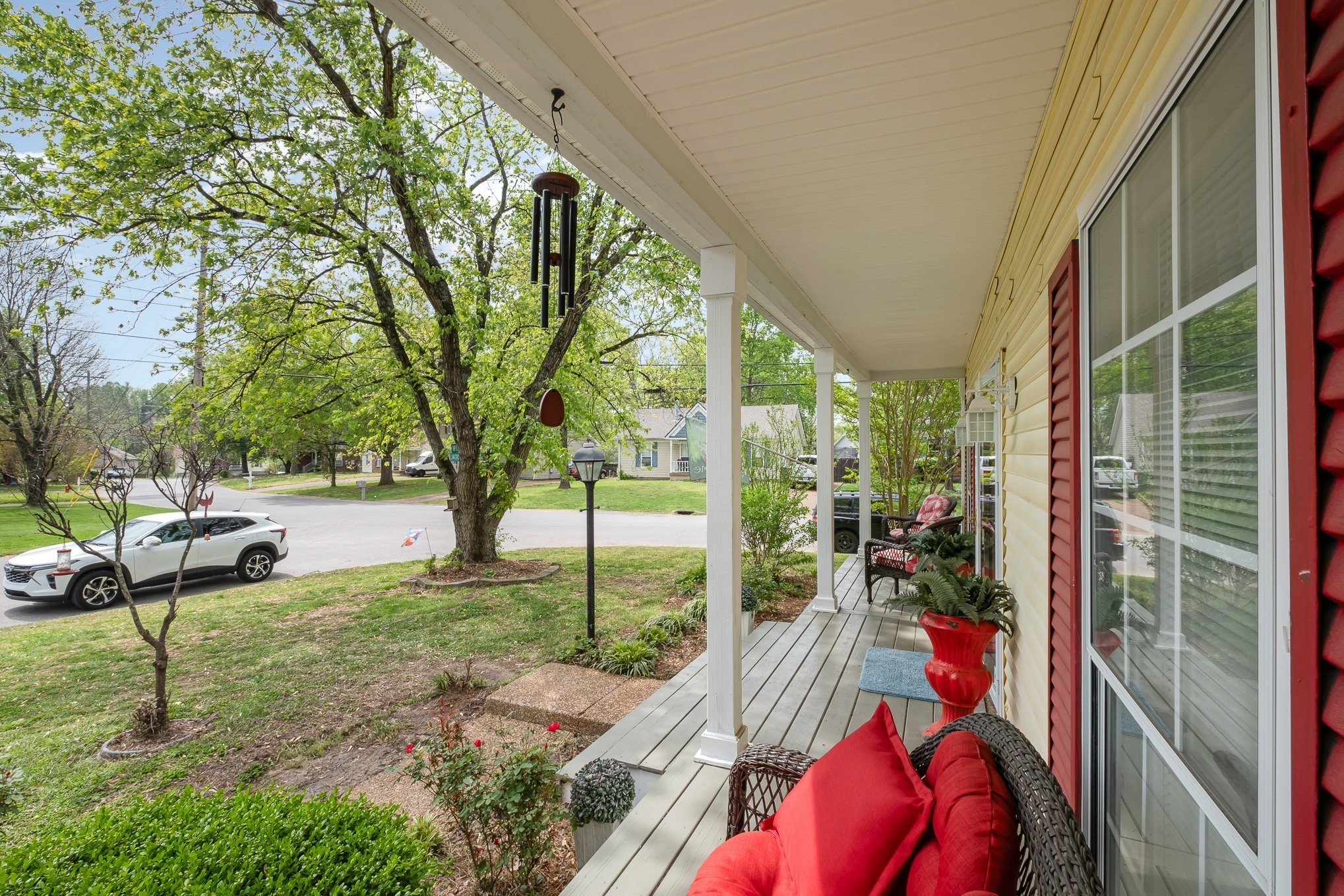 1113 Jacksons Valley Road Hermitage, TN 37076 - Photo 3 of 26 a view of backyard with table and chairs and wooden fence