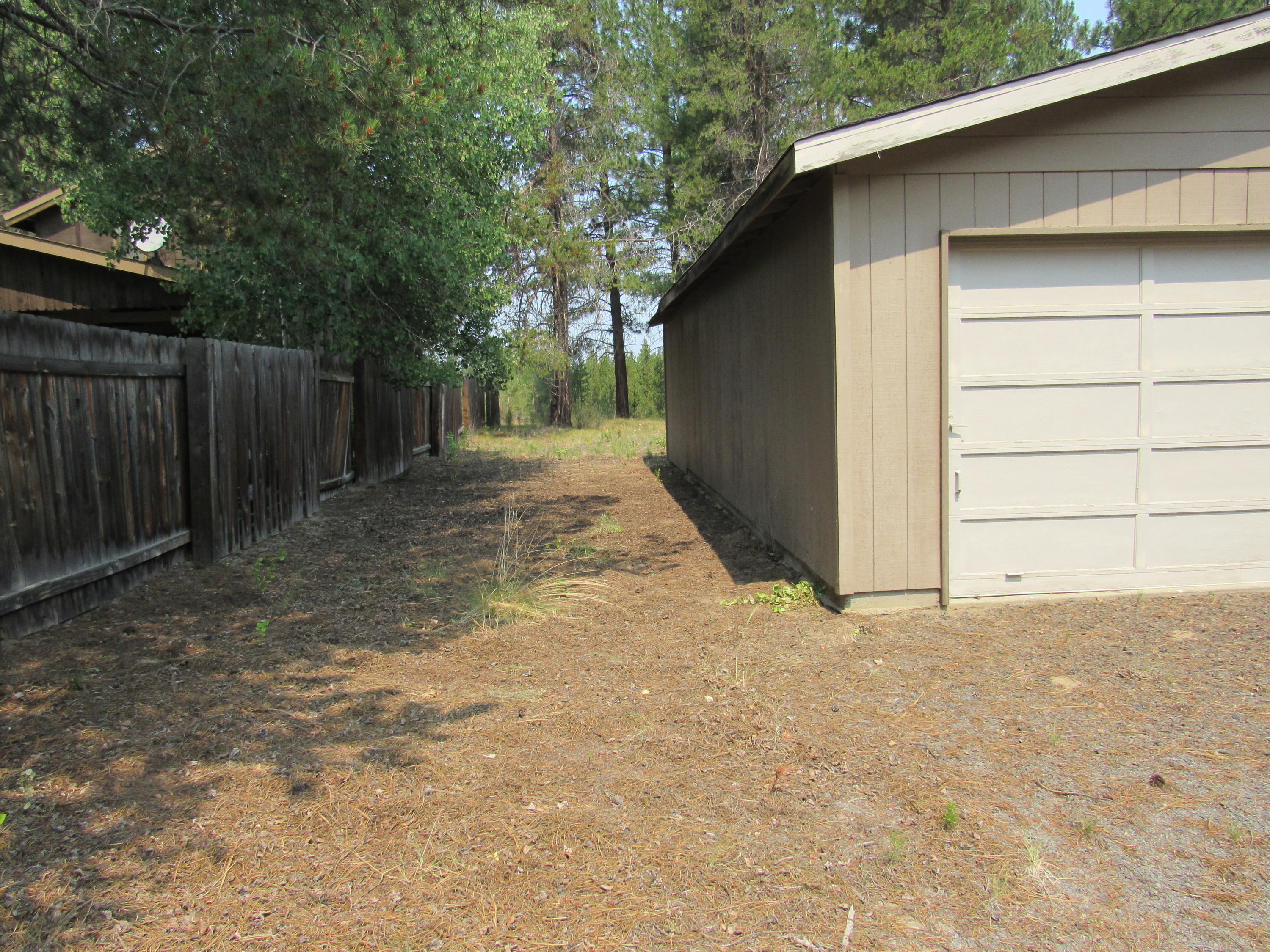 51582 Ash Road La Pine, OR 97739 - Photo 8 of 52 Side of HOuse towards fence Use