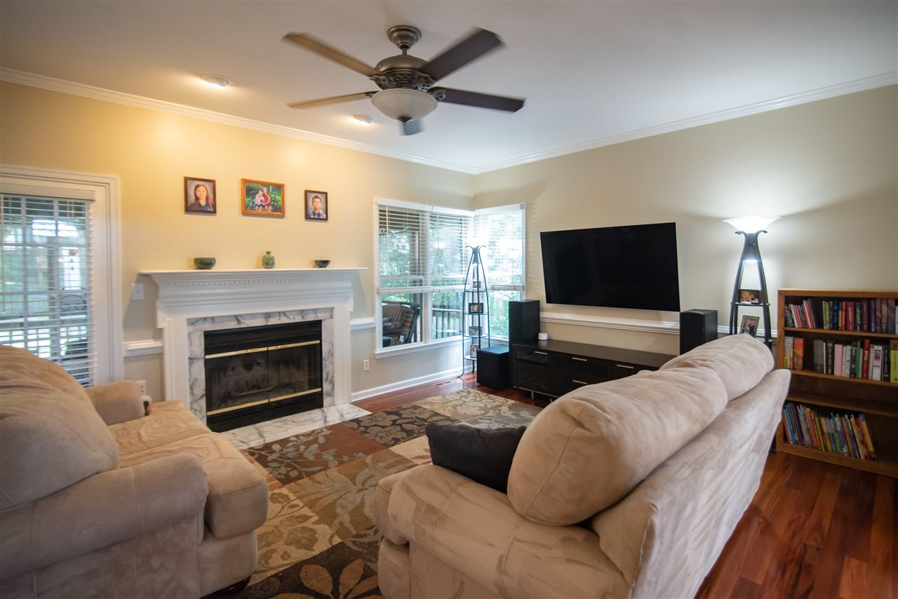 9720 Talman Court Raleigh, NC 27615 - Photo 14 of 30 Plenty of space to lounge with friends and family. Family Room