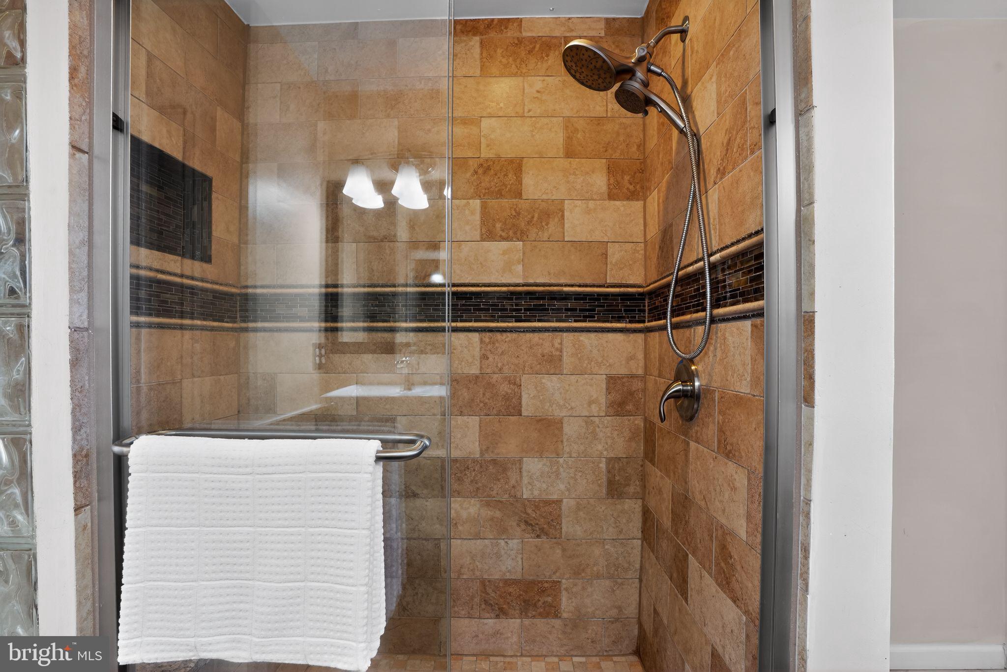 2502 18th Street Northeast Washington, DC 20018 - Photo 19 of 33 Walk in shower with bench seating