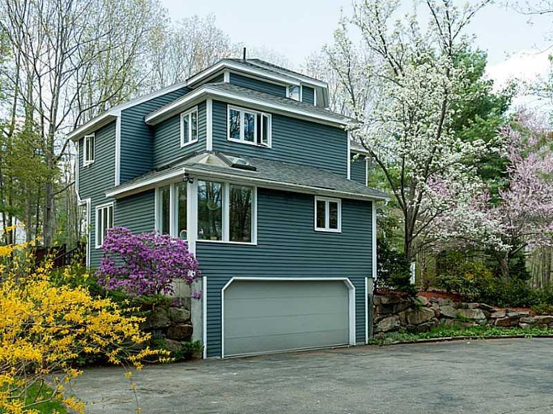 51 Riversedge Drive York, ME 03909 - Photo 23 of 23 Exterior Front. Spring blooms