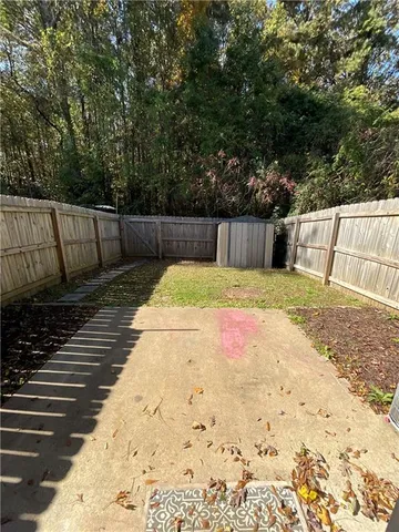 a view of balcony with wooden floor