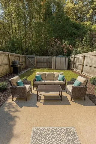 a roof deck with couches and wooden fence