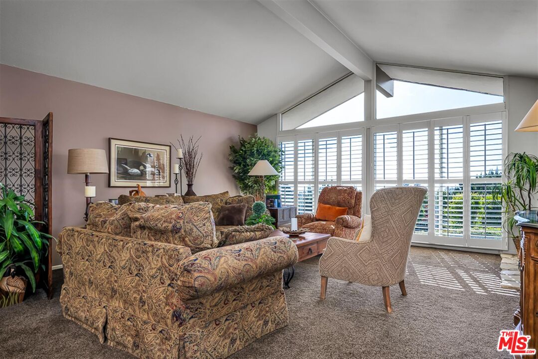 29519 Oceanport Road Rancho Palos Verdes, CA 90275 - Photo 12 of 42 a living room with furniture and a large window