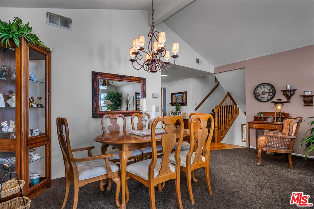 29519 Oceanport Road Rancho Palos Verdes, CA 90275 - Photo 13 of 42 a dining room with furniture a chandelier and window