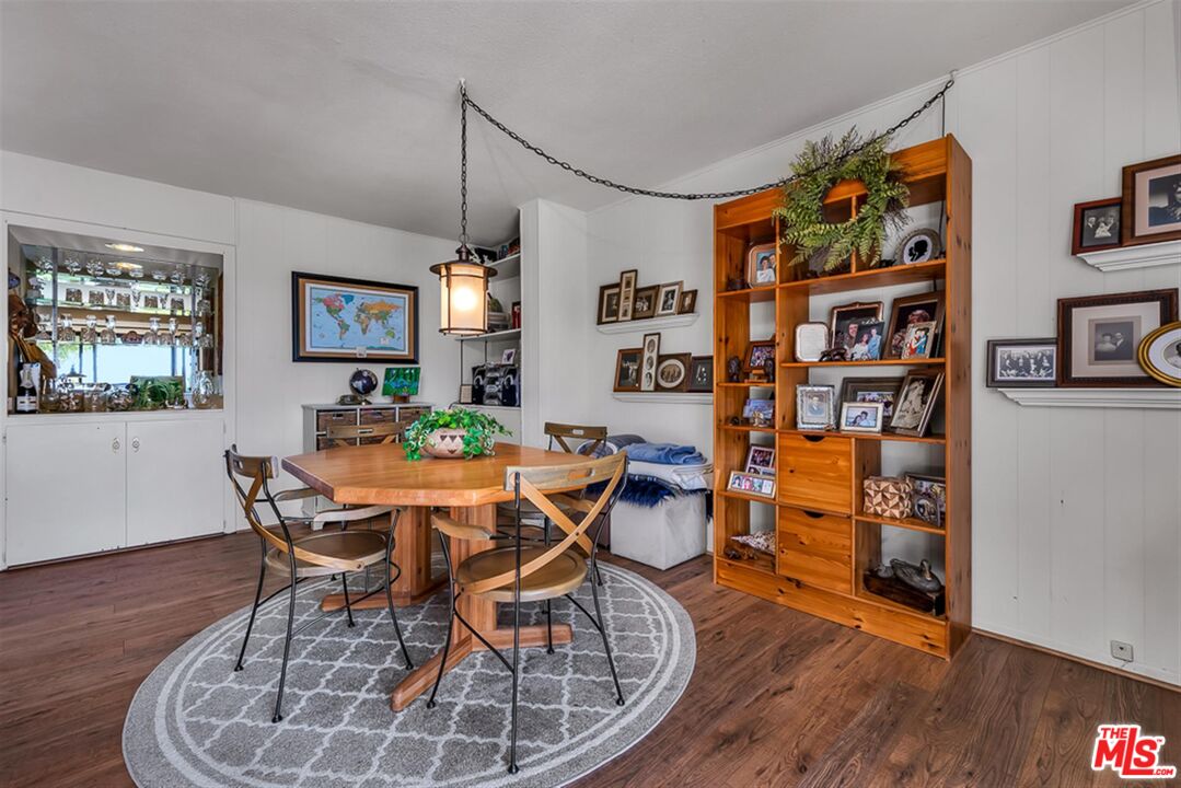 29519 Oceanport Road Rancho Palos Verdes, CA 90275 - Photo 20 of 42 a dining room with furniture and wooden floor