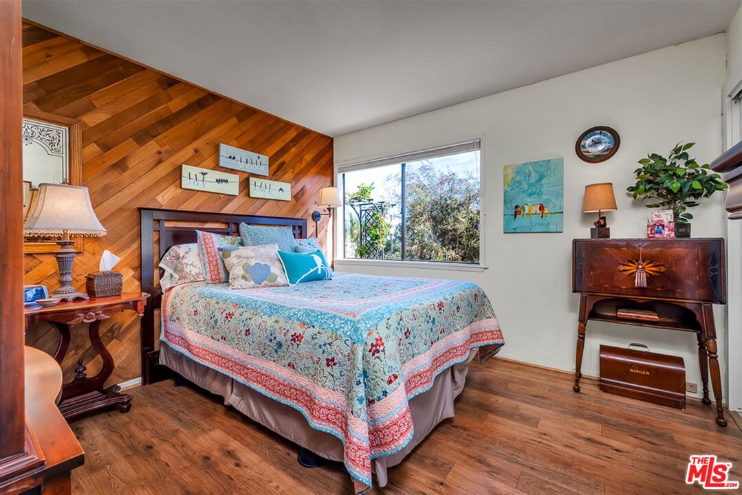 29519 Oceanport Road Rancho Palos Verdes, CA 90275 - Photo 21 of 42 a bed sitting in a bedroom next to a window