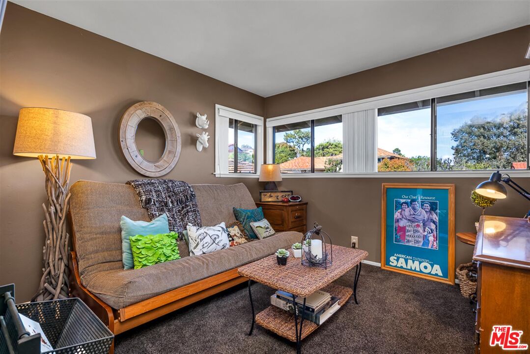 29519 Oceanport Road Rancho Palos Verdes, CA 90275 - Photo 23 of 42 a living room with furniture and a window