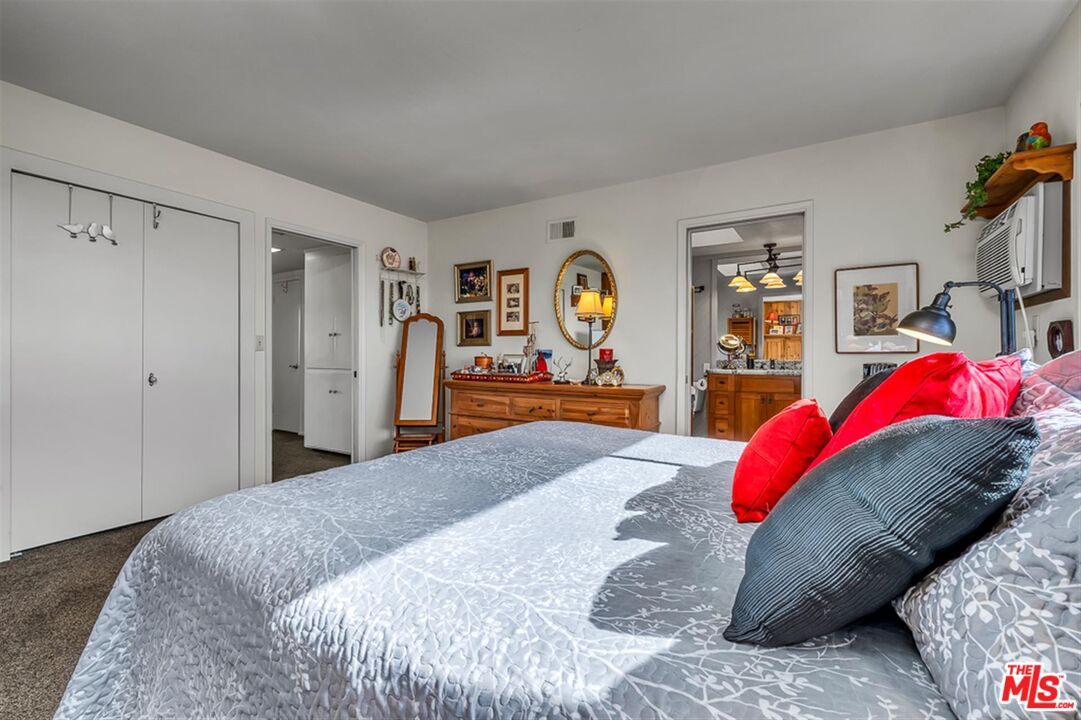 29519 Oceanport Road Rancho Palos Verdes, CA 90275 - Photo 26 of 42 a bedroom with a bed and a couch