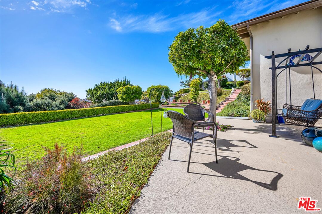 29519 Oceanport Road Rancho Palos Verdes, CA 90275 - Photo 30 of 42 a view of a swimming pool with a patio