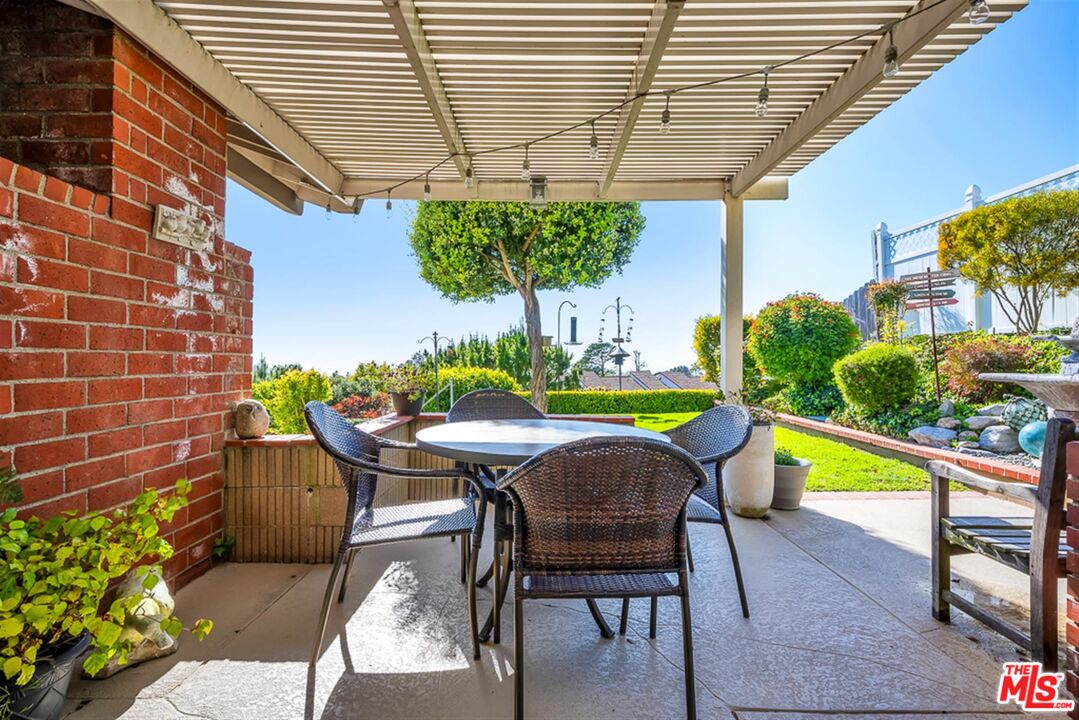 29519 Oceanport Road Rancho Palos Verdes, CA 90275 - Photo 33 of 42 a view of a chairs and table in the patio