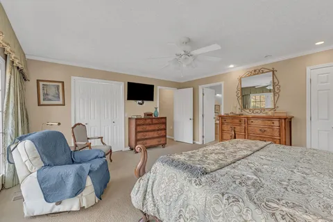 a bedroom with furniture and a bed