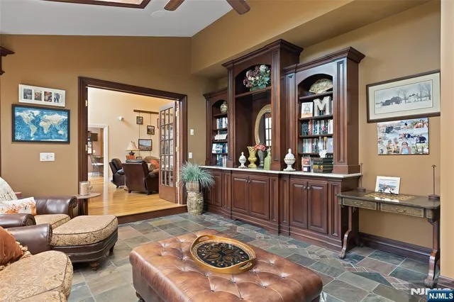 a living room with furniture and window