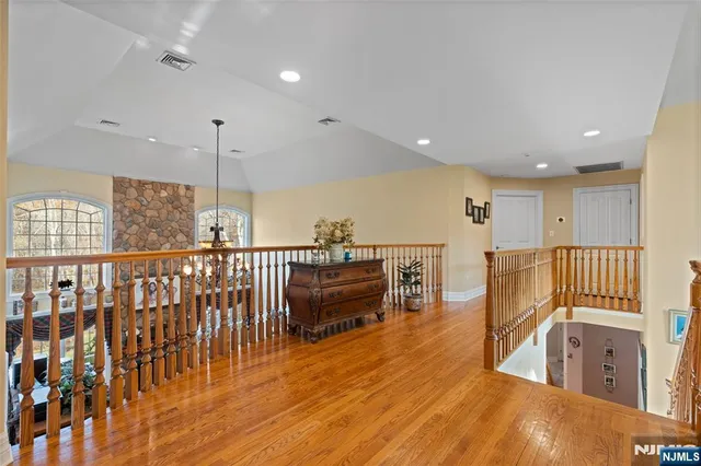 a view of a living room and a balcony