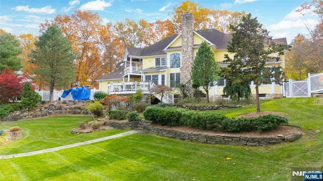 an aerial view of a house with outdoor space