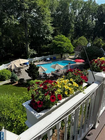 a view of a house with a swimming pool