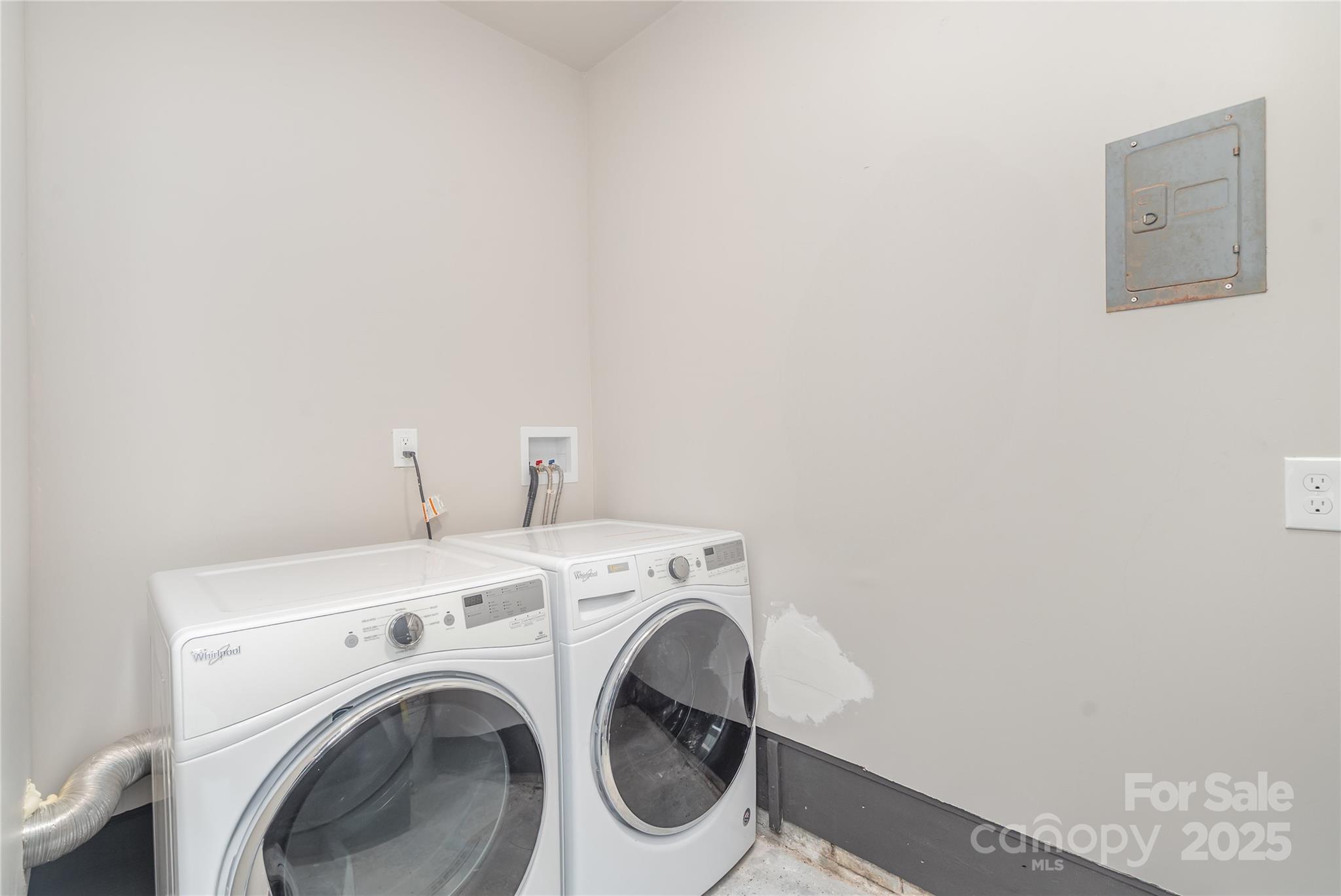 1041 Crowders Creek Road Gastonia, NC 28052 - Photo 16 of 18 a utility room with dryer and washer