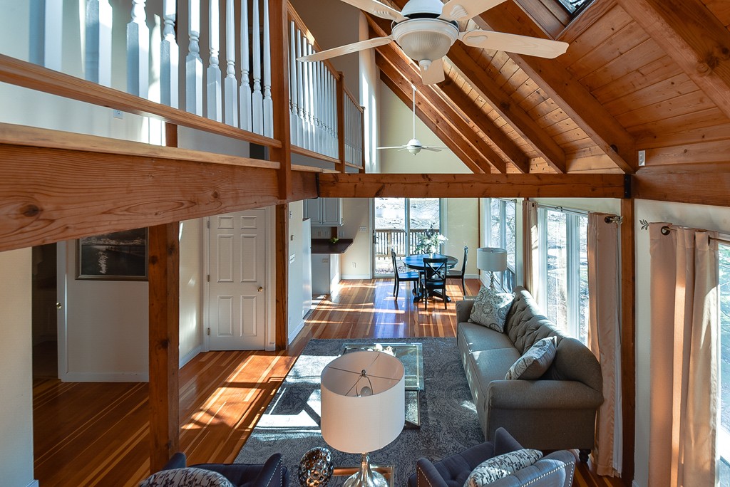 65 Oakhurst Road Hopkinton, MA 01748 - Photo 13 of 27 a living room with furniture and a large window