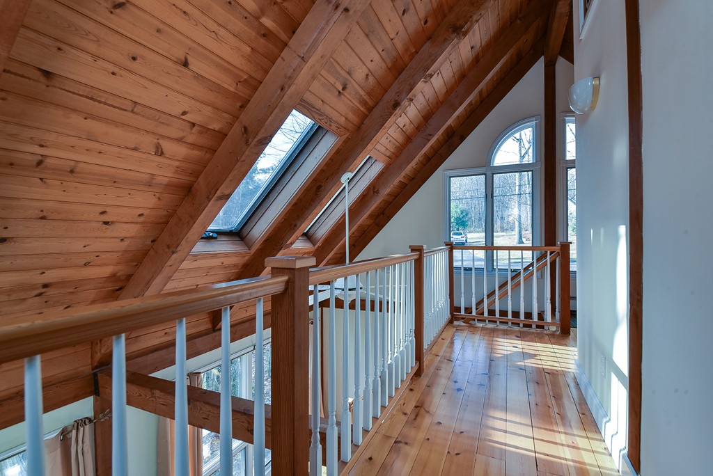 65 Oakhurst Road Hopkinton, MA 01748 - Photo 14 of 27 a view of staircase with large windows