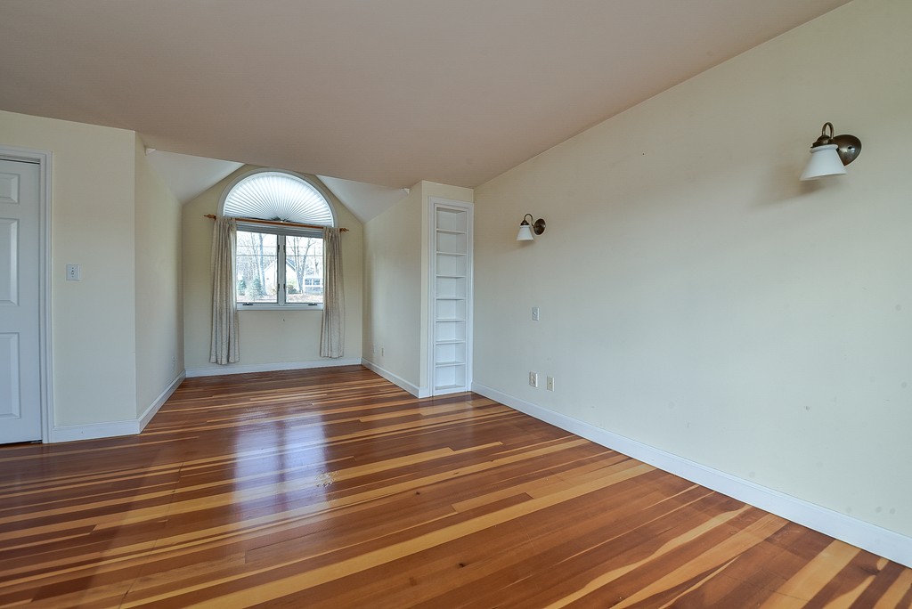 65 Oakhurst Road Hopkinton, MA 01748 - Photo 16 of 27 a view of empty room with wooden floor