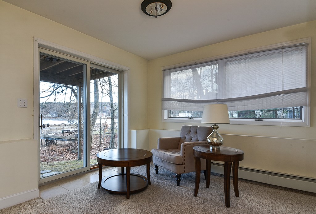 65 Oakhurst Road Hopkinton, MA 01748 - Photo 22 of 27 a living room with furniture and a window