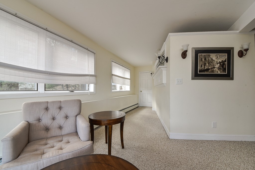 65 Oakhurst Road Hopkinton, MA 01748 - Photo 25 of 27 a living room with furniture