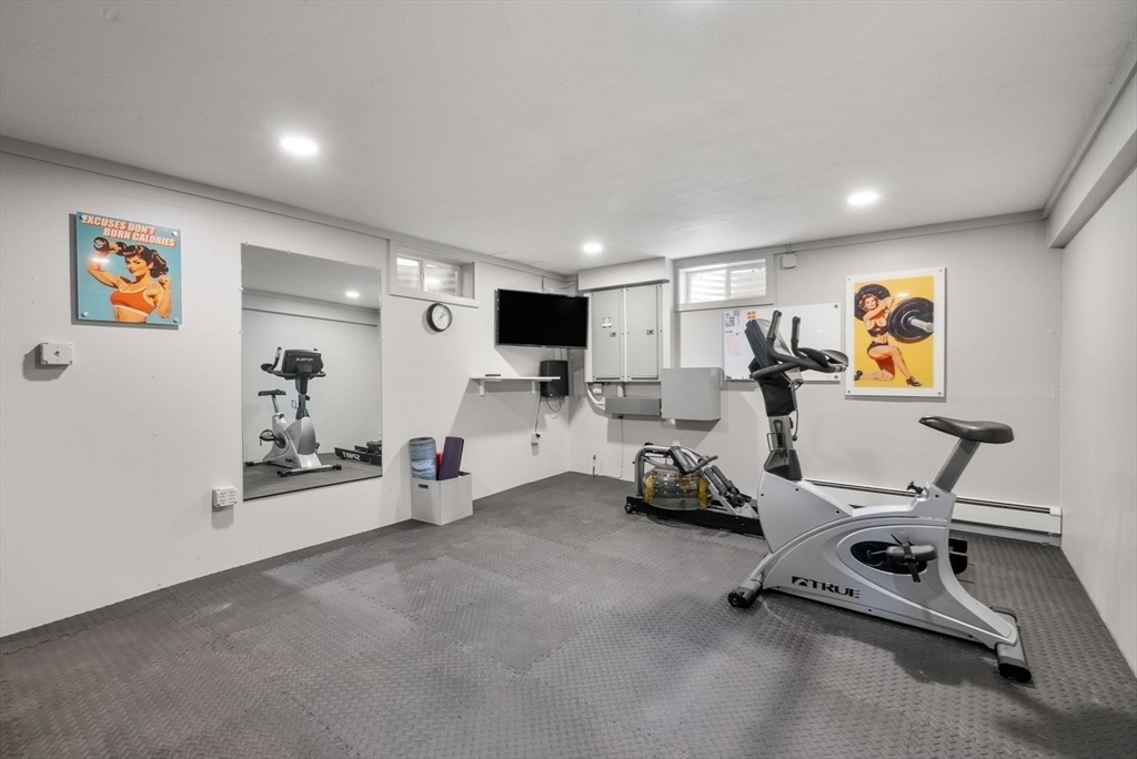 49 Walpole Street Dover, MA 02030 - Photo 28 of 40 a view of a room with gym equipment