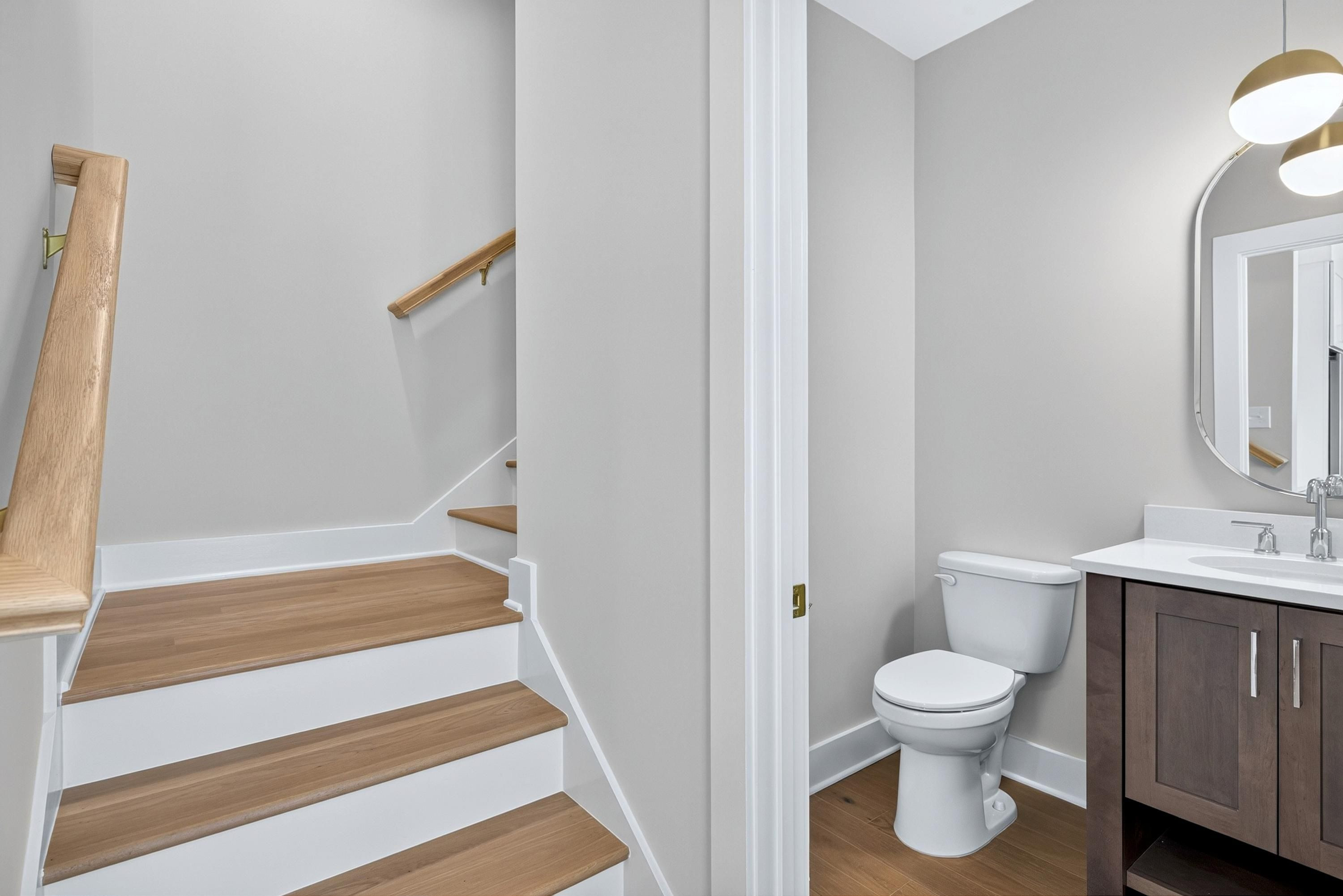 407 Chatham View Road Cary, NC 27511 - Photo 30 of 77 Half Bath and Stairs to BR area