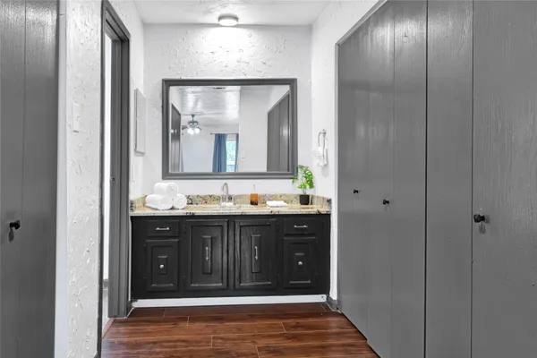 a view of a bathroom with a glass door