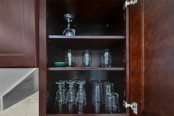 a bathroom with a toilet and a mirror