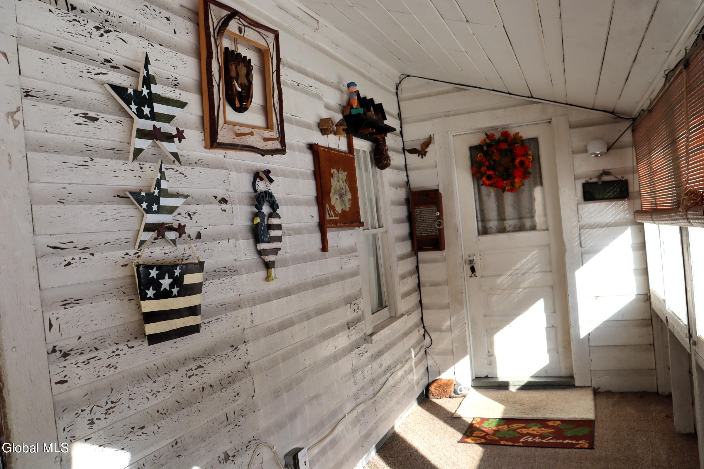 976 High Street Thurman, NY 12810 - Photo 3 of 19 Front porch