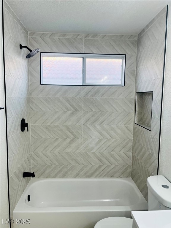 7837 Millhopper Avenue Las Vegas, NV 89128 - Photo 22 of 28 Bathroom with bathtub / shower combination and vanity