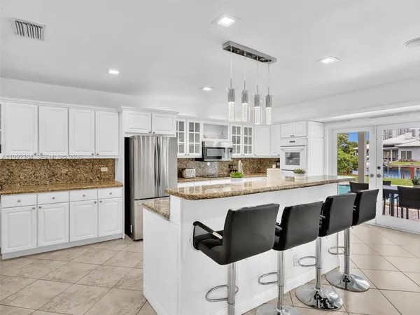 $12,950 | 413 Tamarind Drive, Hallandale Beach, FL 33009