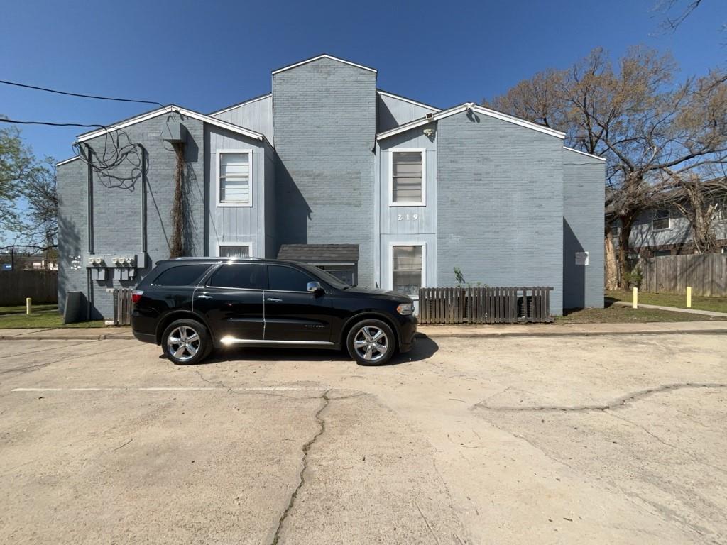 a car parked in front of a house
