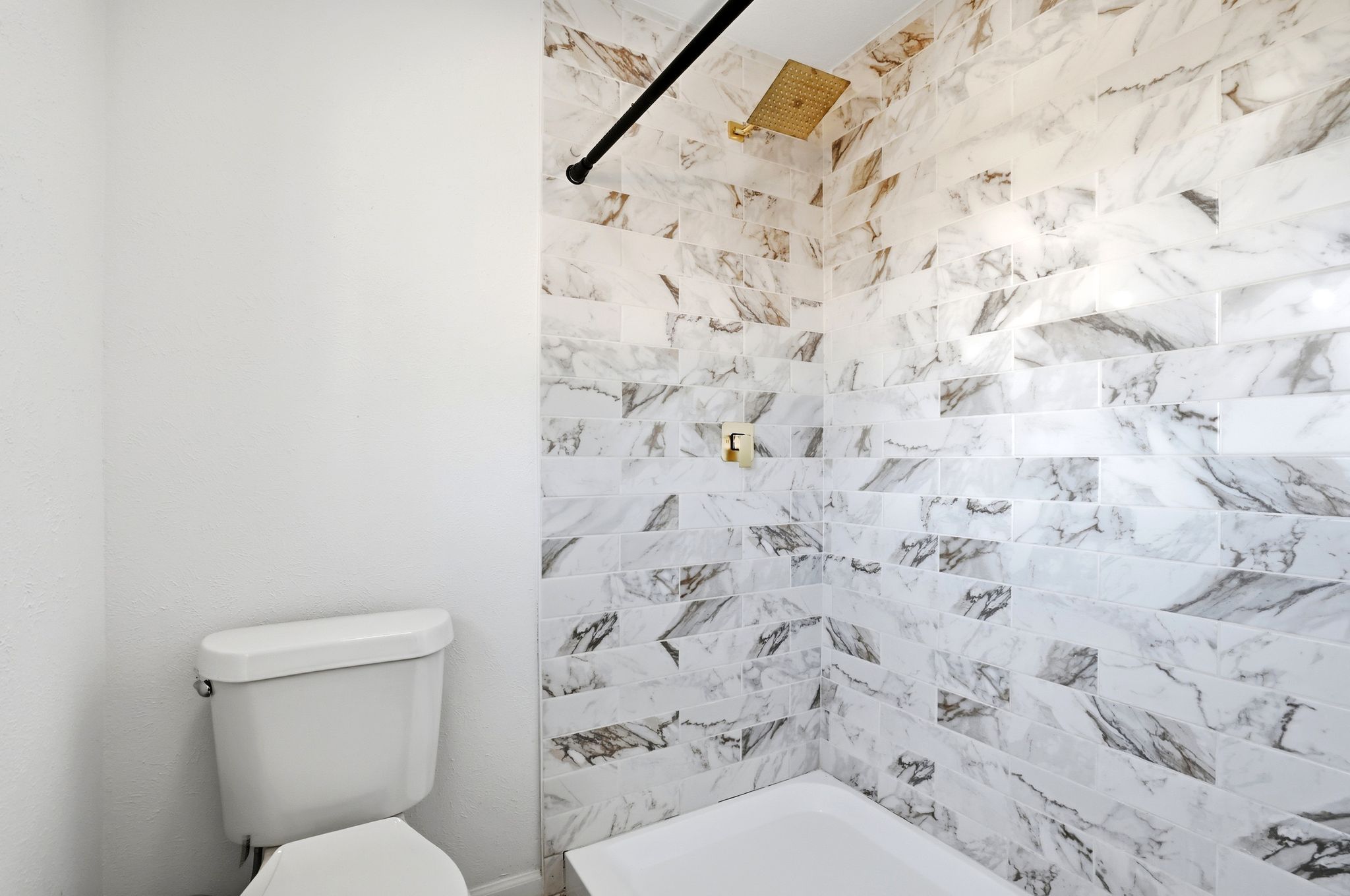 13004 Esplanade Street Austin, TX 78727 - Photo 12 of 36 Primary bathroom (upstairs) featuring shower/tub combination