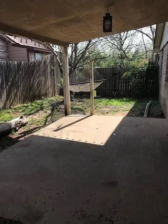 a backyard of a house with lots of green space