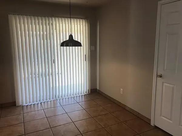 a view of a livingroom with a window