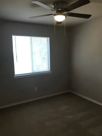 an empty room with a window