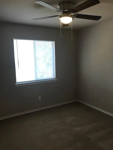 902 Quartz Court, Unit B Cedar Park, TX 78613 - Photo 9 of 12 an empty room with a window