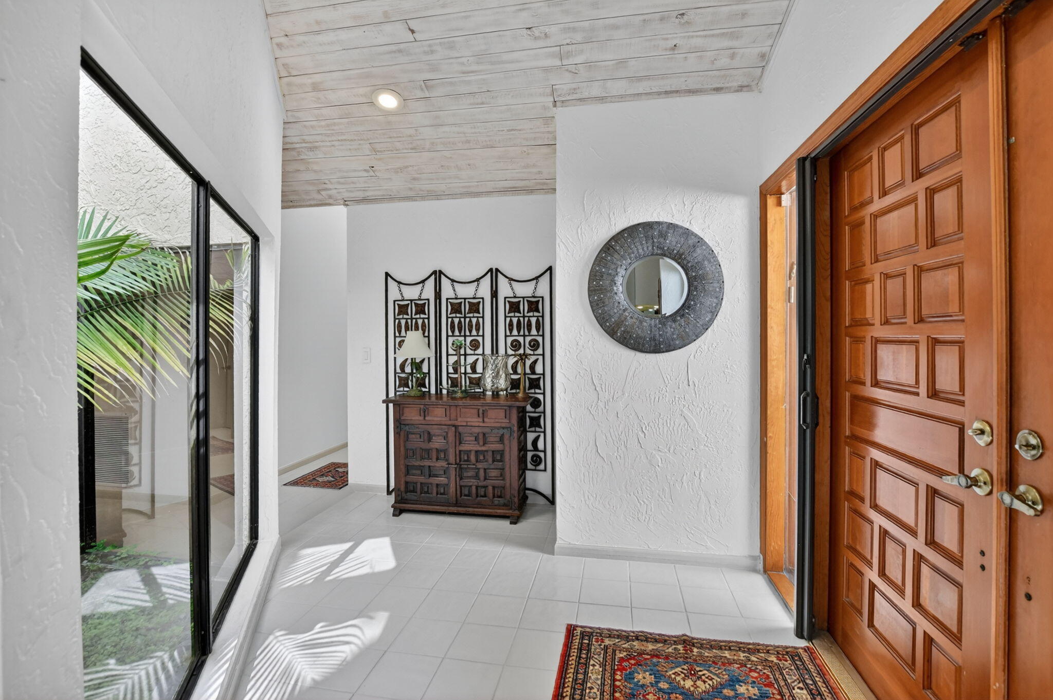 22519 Esplanada Circle, Unit W Boca Raton, FL 33433 - Photo 5 of 57 a view of entryway and hall with wooden floor
