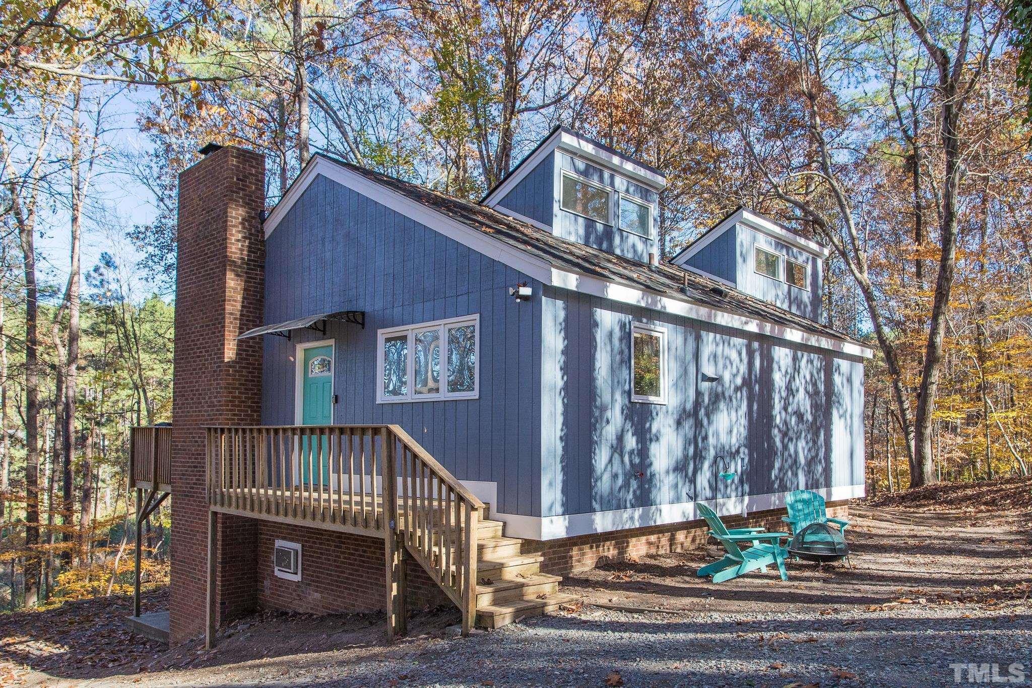 a view of a house with a street