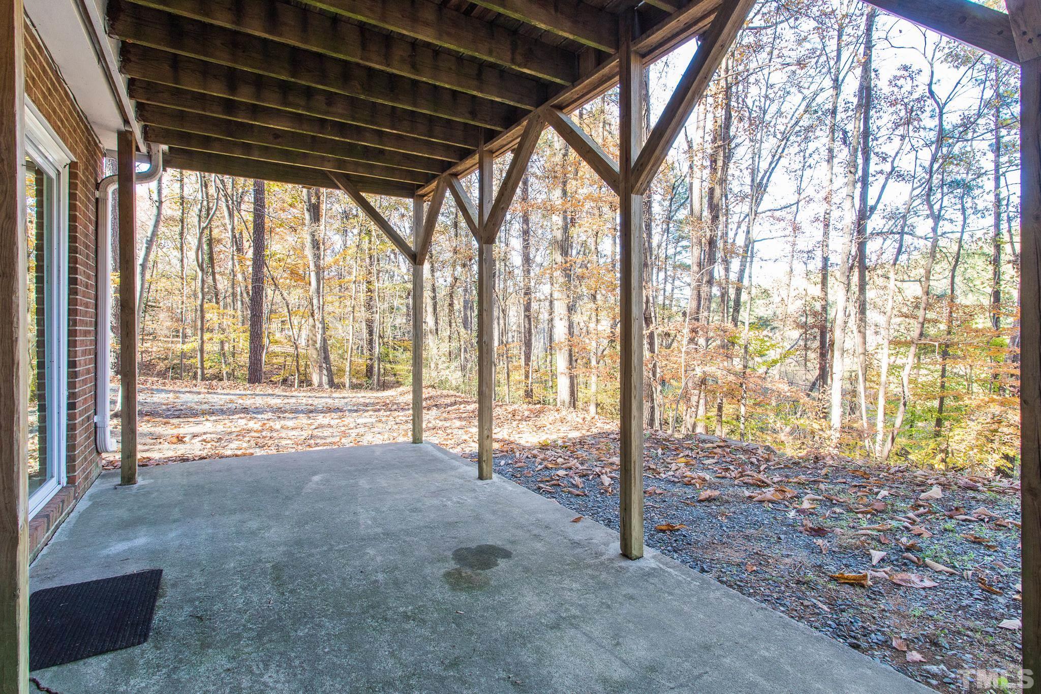 372 Cedar Lake Road Chapel Hill, NC 27516 - Photo 12 of 42 a view of an empty room with windows