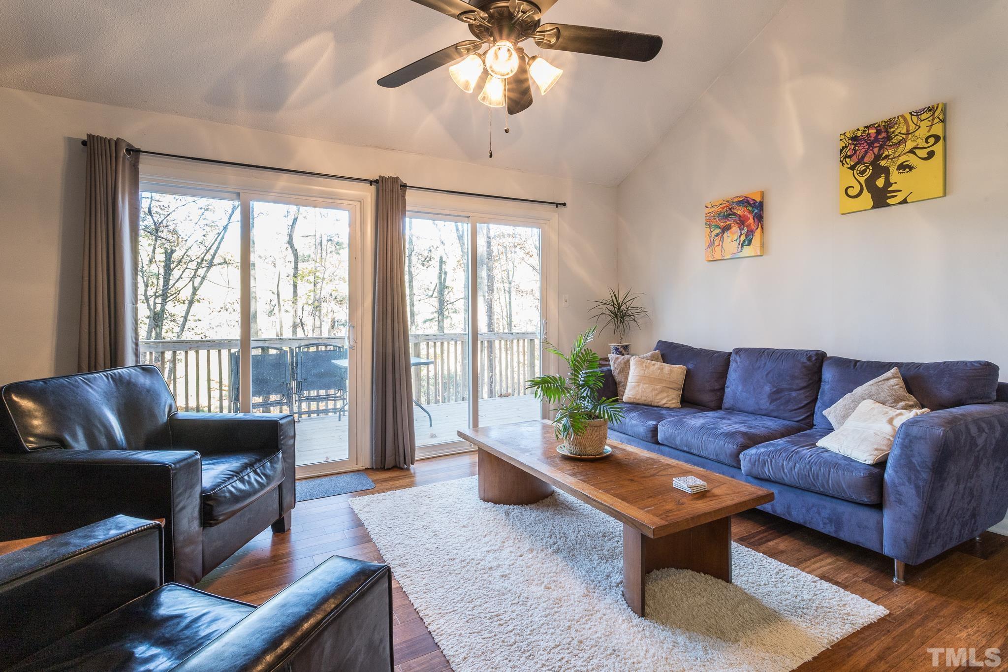 372 Cedar Lake Road Chapel Hill, NC 27516 - Photo 19 of 42 a living room with furniture and a window