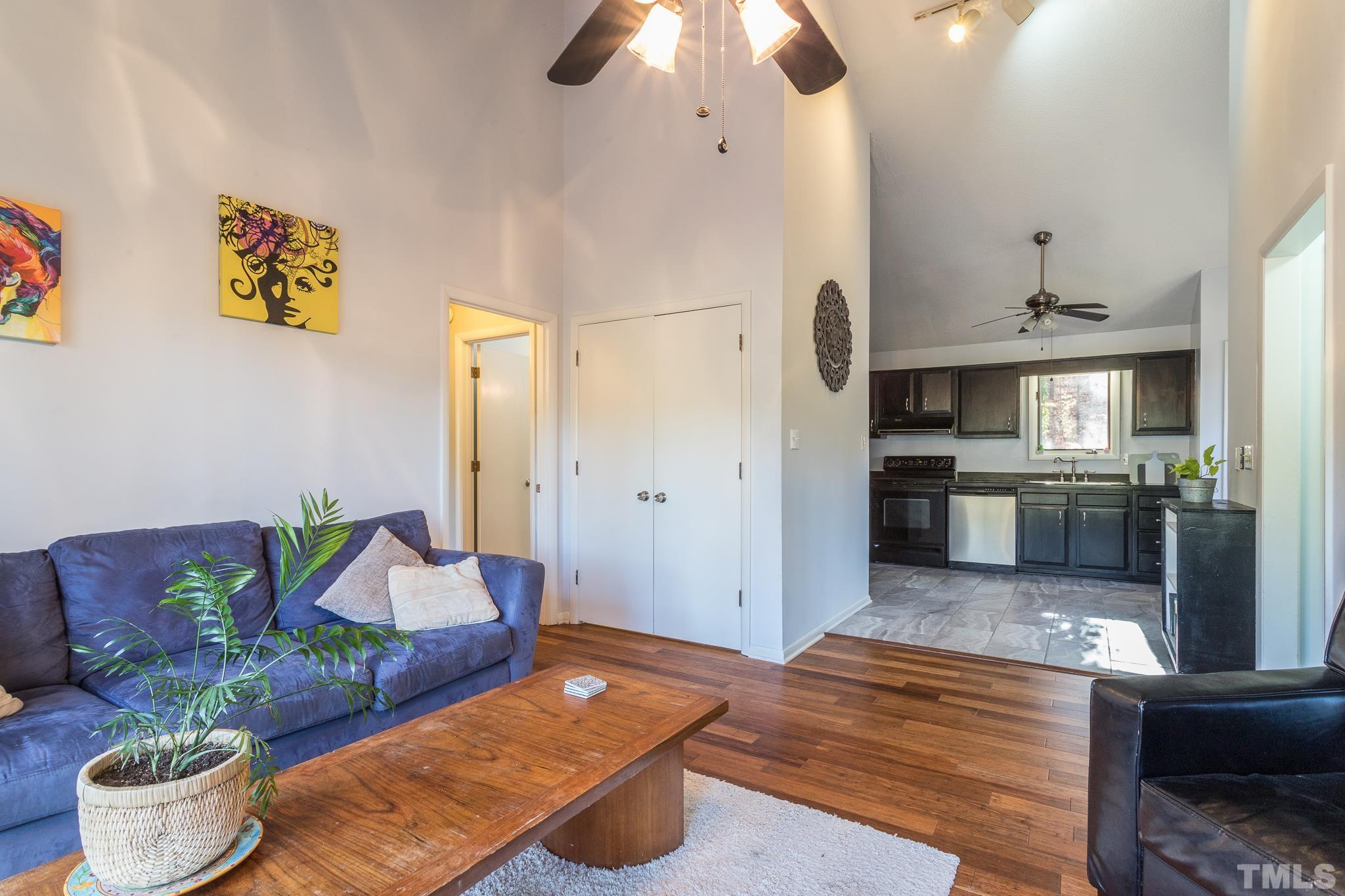 372 Cedar Lake Road Chapel Hill, NC 27516 - Photo 23 of 42 a living room with furniture and kitchen view