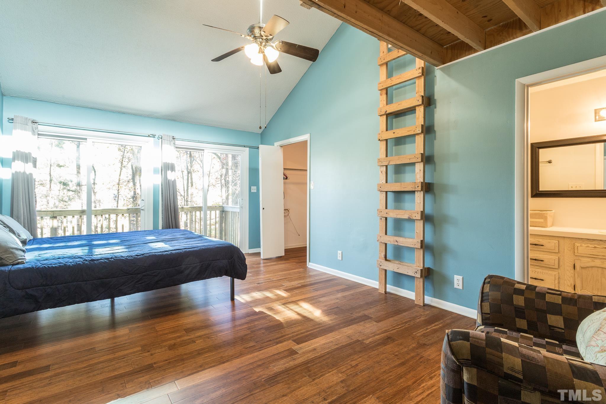 372 Cedar Lake Road Chapel Hill, NC 27516 - Photo 27 of 42 a living room with furniture and a window