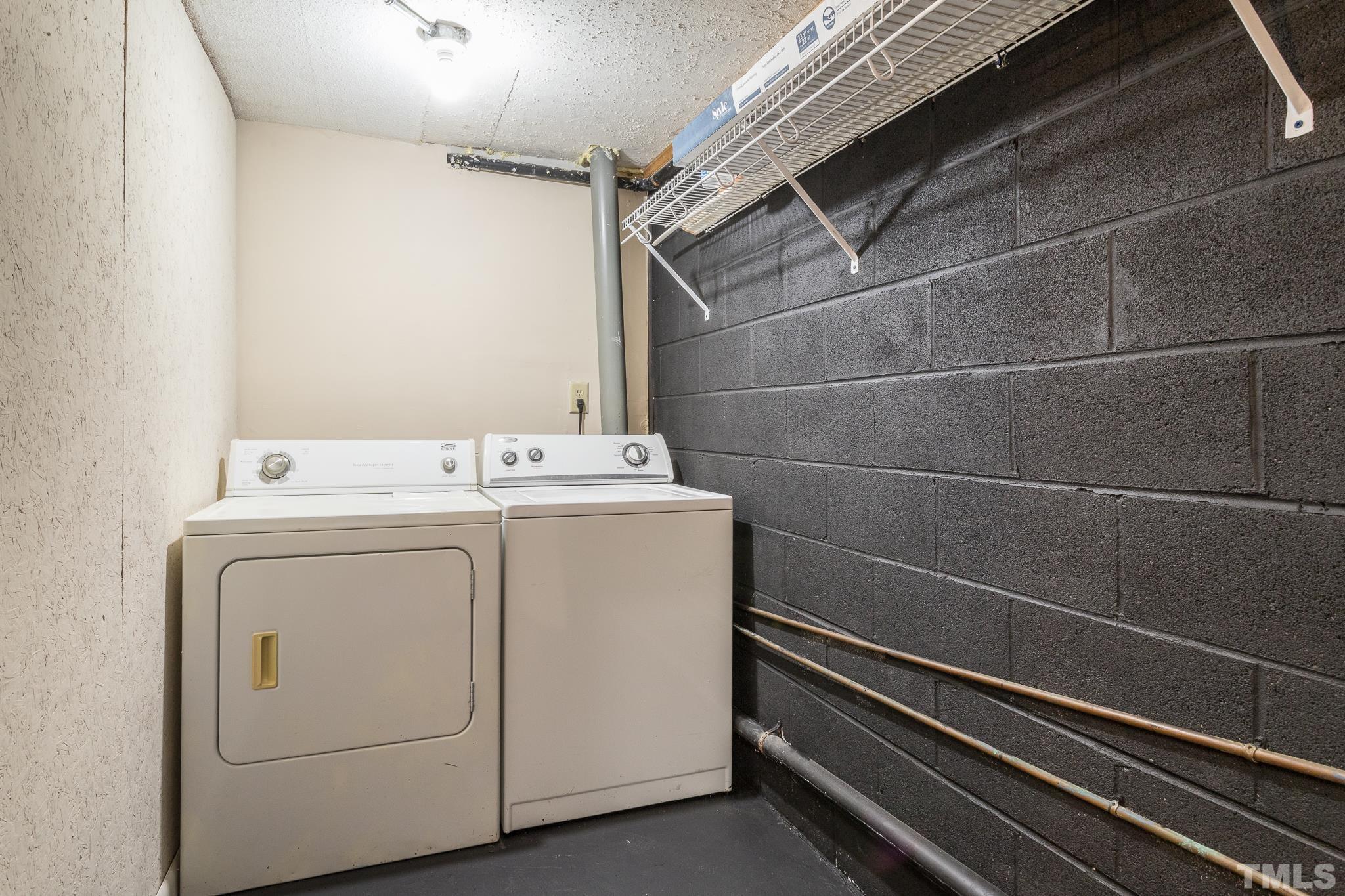 372 Cedar Lake Road Chapel Hill, NC 27516 - Photo 39 of 42 a utility room with dryer and washer