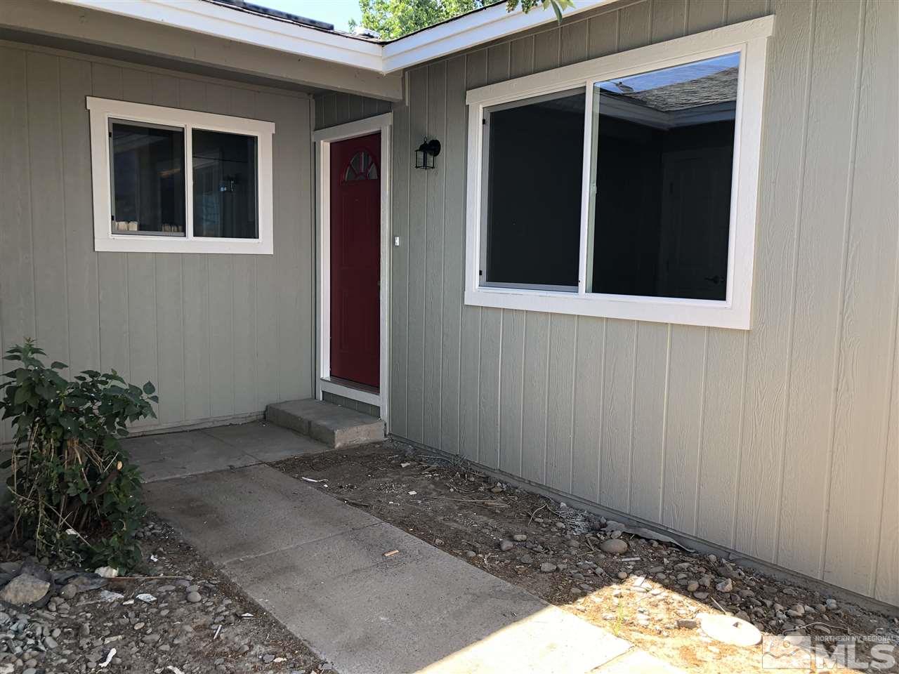 10028 Humite Lane Reno, NV 89506 - Photo 1 of 9 a view of an entrance of house