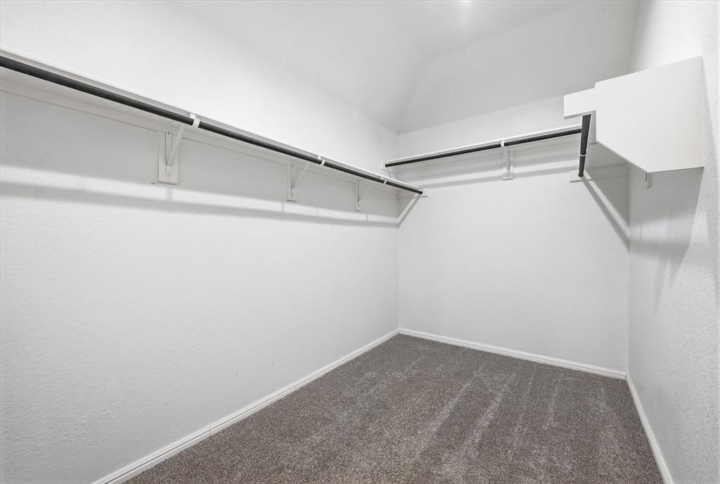 9308 Desertrock Road Fort Worth, TX 76131 - Photo 11 of 23 a view of an empty walk in closet