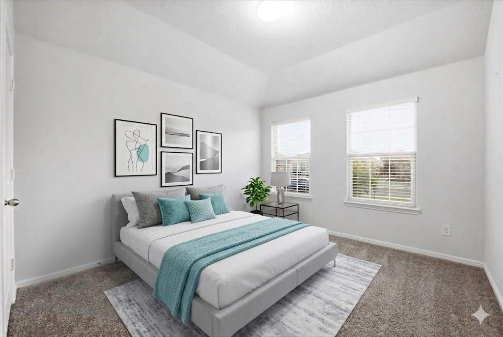 9308 Desertrock Road Fort Worth, TX 76131 - Photo 12 of 23 a bedroom with a large bed and a window