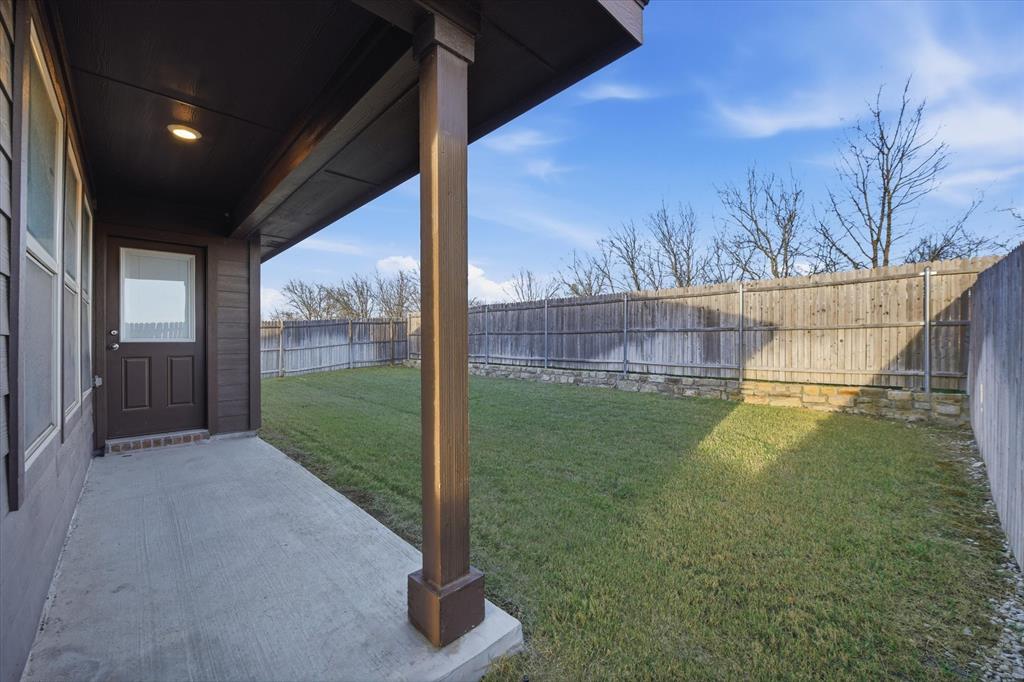 9308 Desertrock Road Fort Worth, TX 76131 - Photo 20 of 23 a view of a garden from a balcony